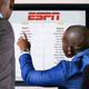 Illustration for article titled Desperate NBA Prospects Crowd Around List Taped To ESPN Bulletin Board To See Who Got Drafted